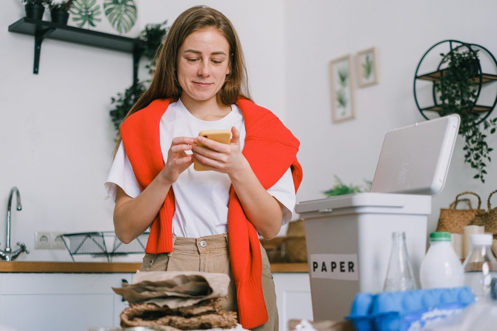 a woman holding a phone