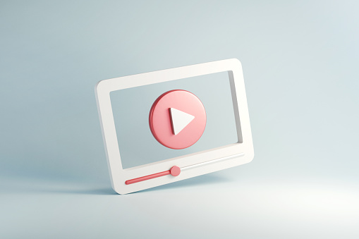 3D graphic of a white screen with a pink play button in the center.