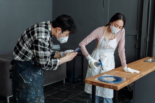 Man and woman shooting a video for an Instagram Story ad. 