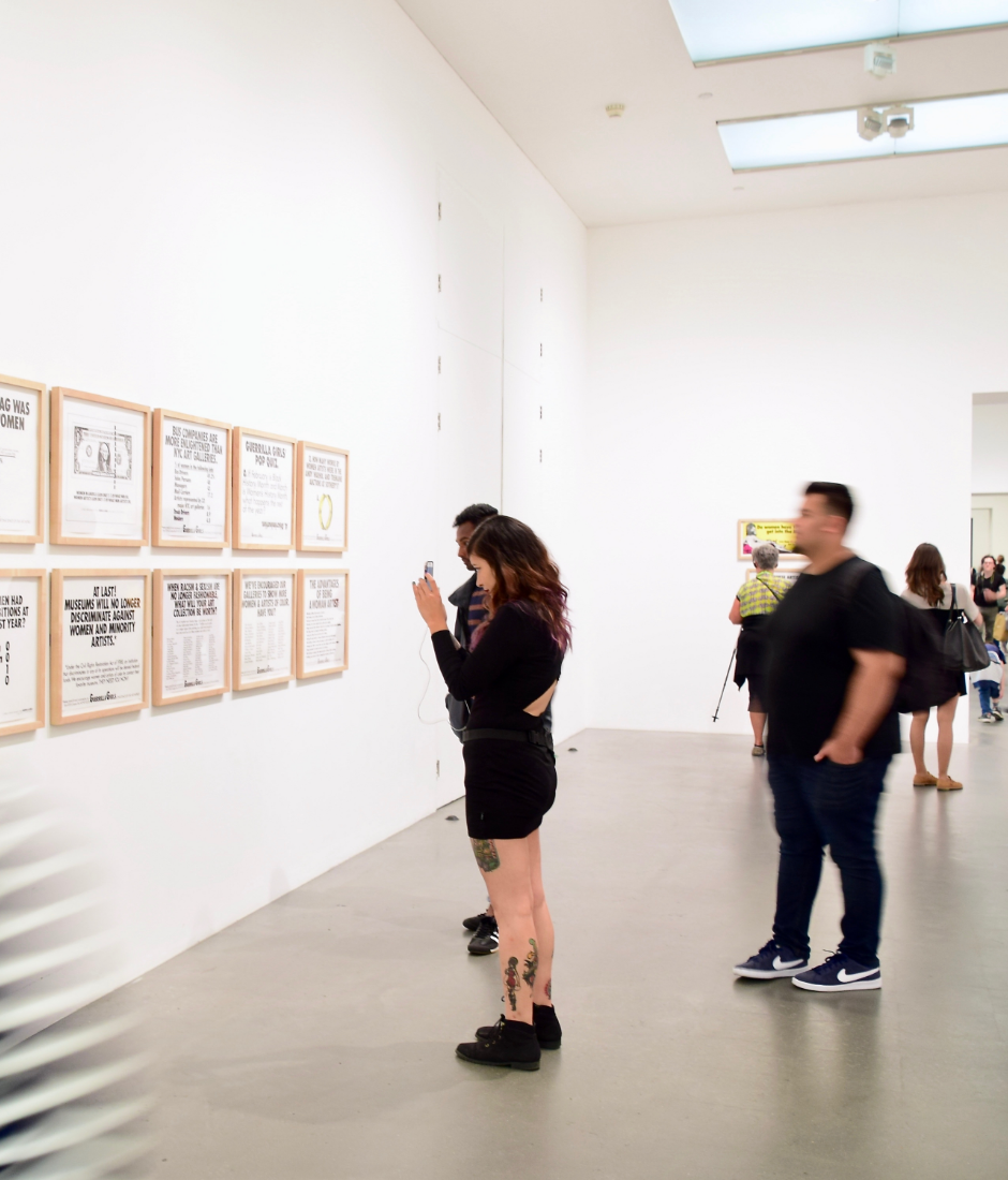 a group of people in a museum