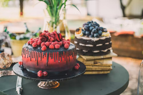 Photo of two cakes advertising cake business on Instagram.