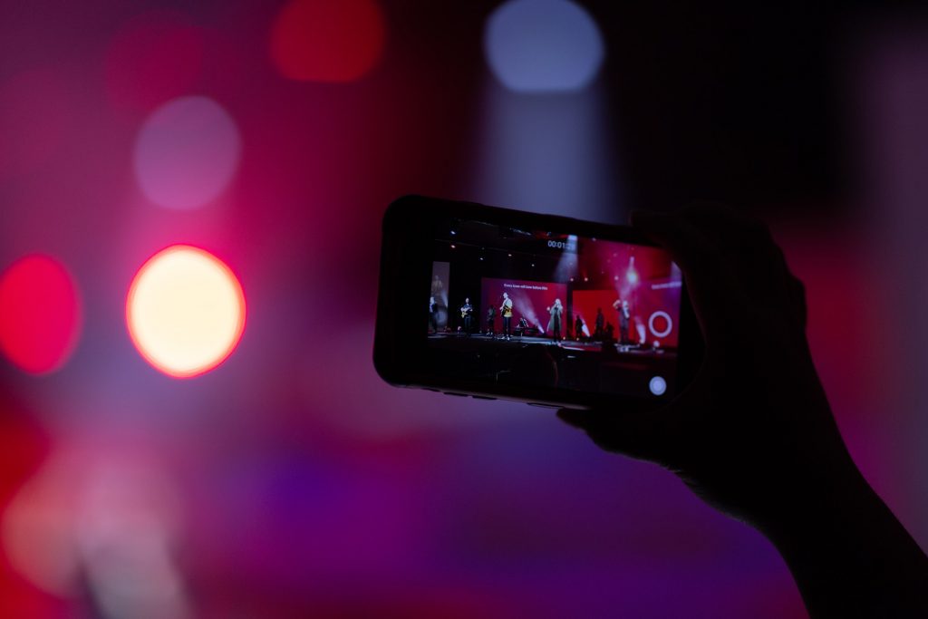 A shallow focus photo of person holding smartphone.