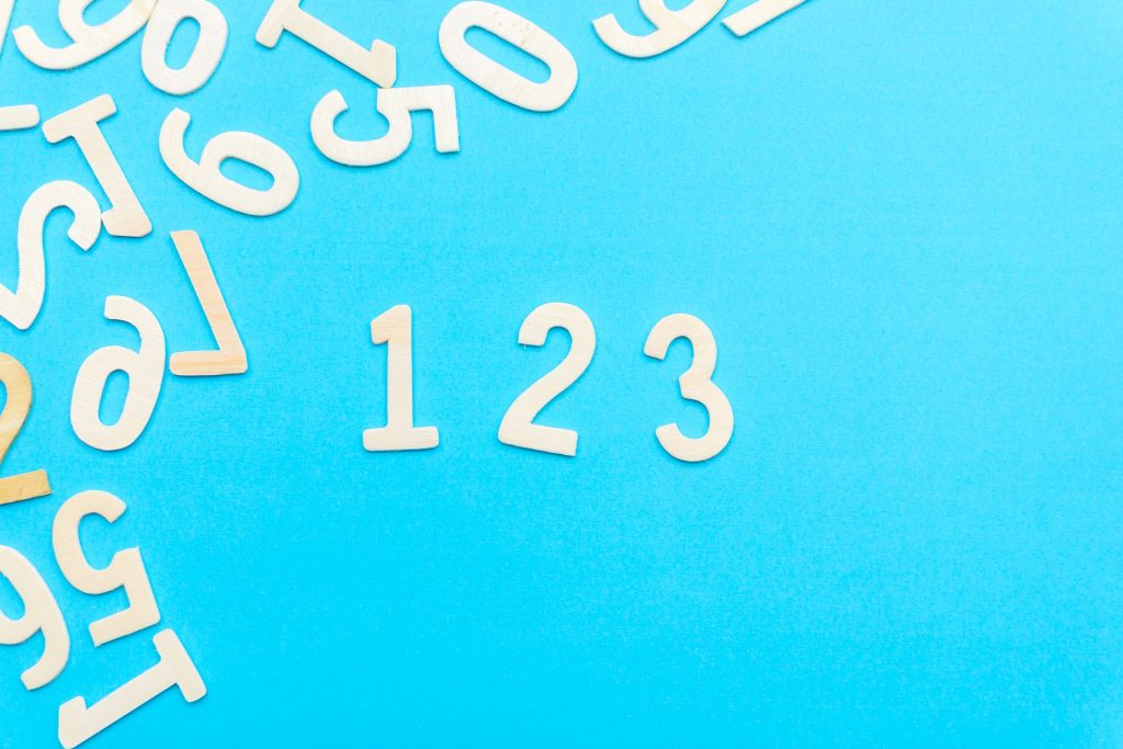Blue background with white jumbled numbers.