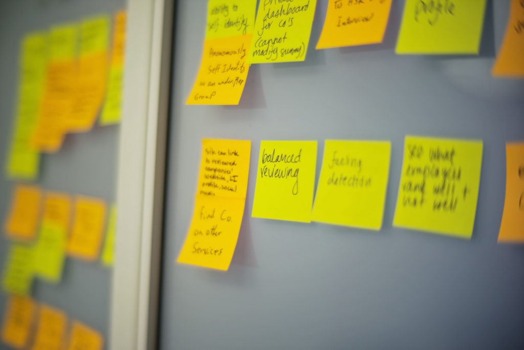 Post-its on a white board for Instagram content scheduling. 