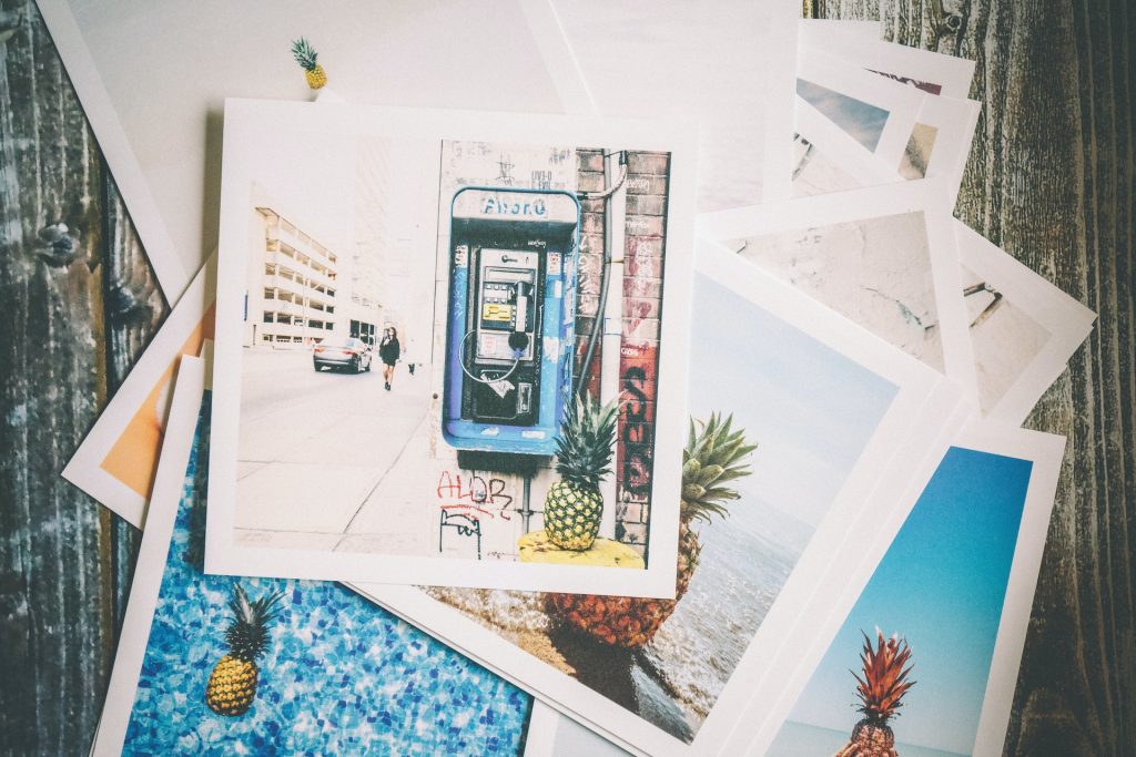 a pile of photos on a table