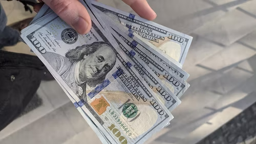 Hundred dollar bills to buy Insta followers.