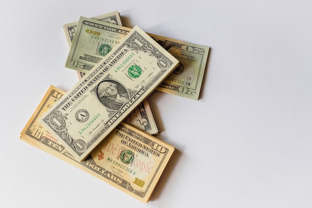 Dollar bills to buy high quality followers for Instagram.