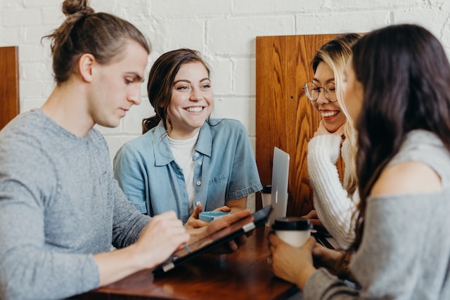 A group of people highly engaged in conversation.
