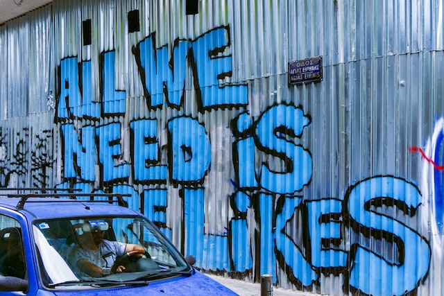 darianepriakhinagGoi4QTXXBAunsplash | Path Social Graffiti saying All we need is more likes