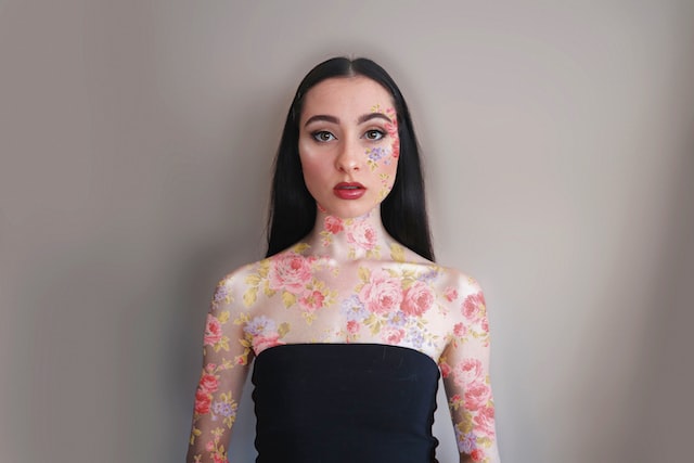 Female Instagram influencer with floral body paint
