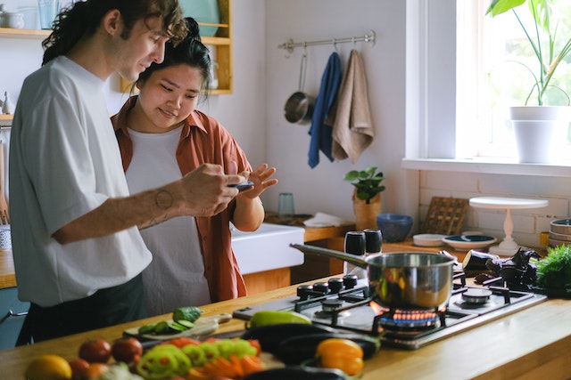 pexels-anna-shvets-12673644 | Path Social Two friends discussing the benefits of a social growth management company.