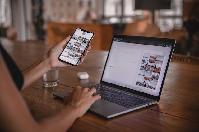 pexels-plann-4549414-1 | Path Social A person using a website to help increase Instagram engagement.
