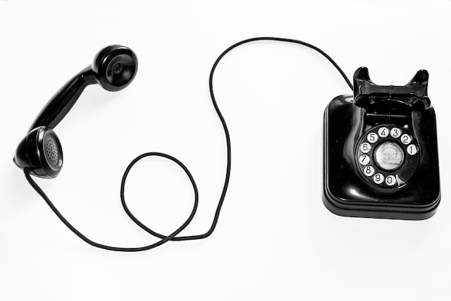 A black rotary phone.