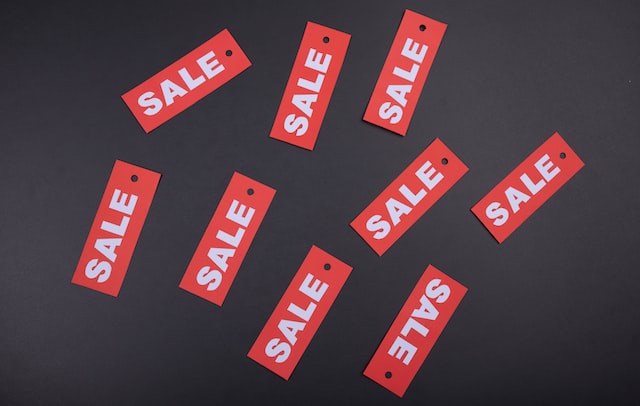 Red and white sale signs.