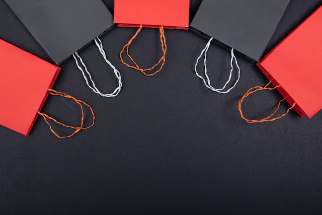 tamanna-rumee-eD1RNYzzUxc-unsplash | Path Social Red and black shopping bags
