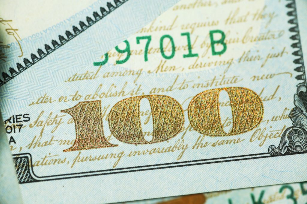 Close-up of a one-hundred-dollar bill. 