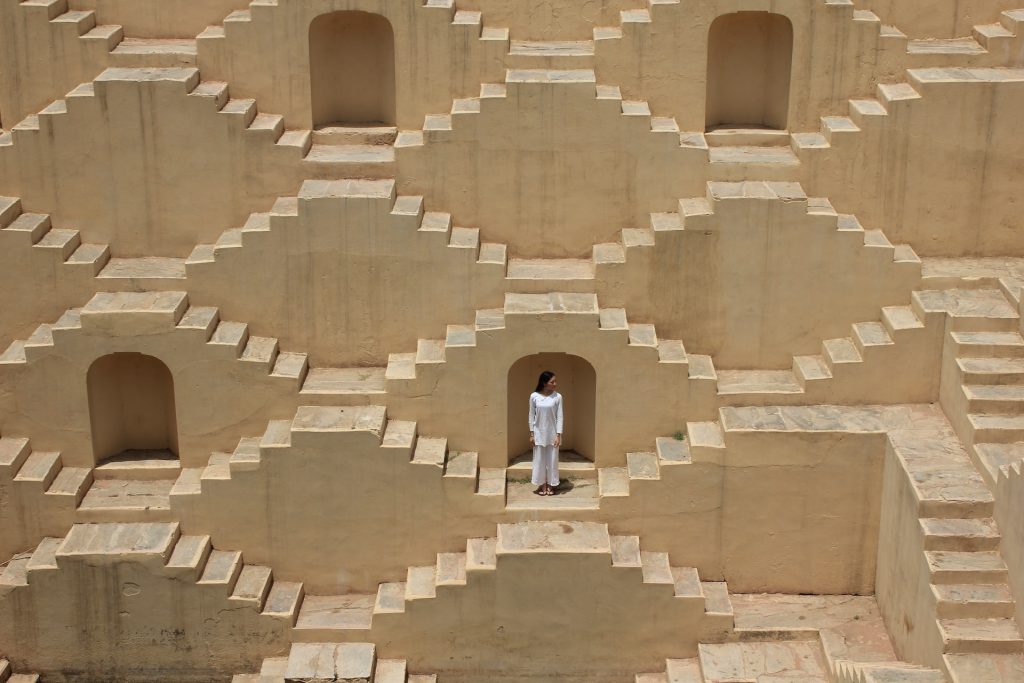 mohammadbagheradibbehroozXHISxWK28unsplash | Path Social Woman standing in the middle of a maze of stairs