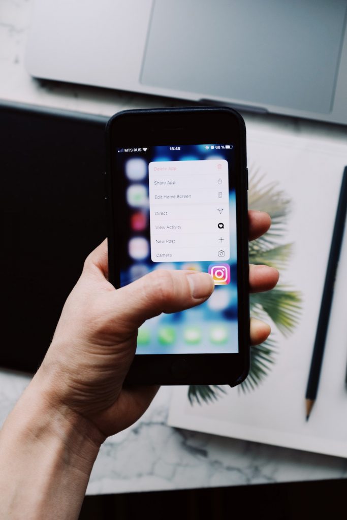 A smartphone highlighting the Instagram app.