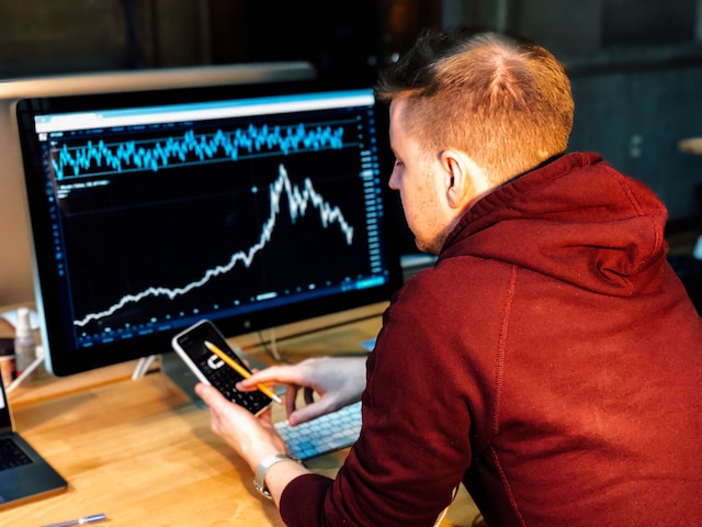 A man checking the graph to see what he can learn from it.