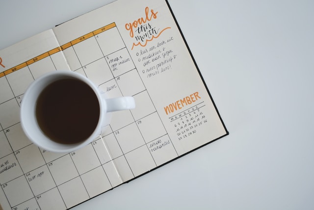a cup of coffee on a calendar