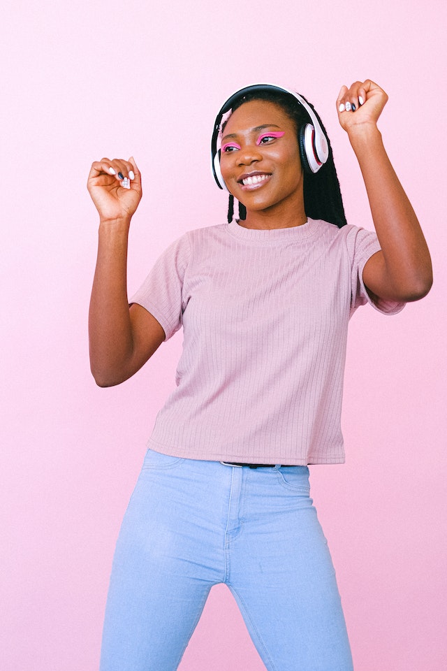 Woman wearing headphones listening to music