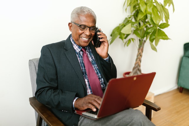 A man looking up the answer to what is the safest way to buy Instagram followers.