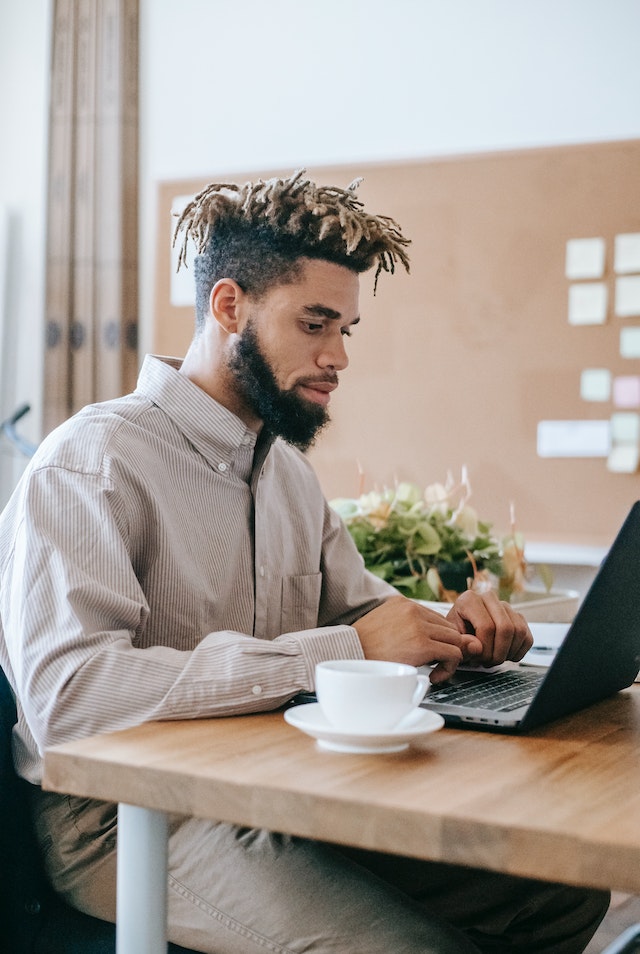 A man looking up the question: How do I get 1,000 followers on Instagram?