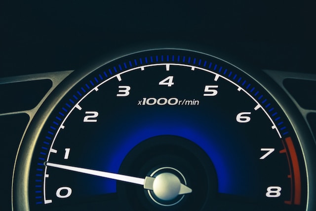 Black and blue analog speedometer