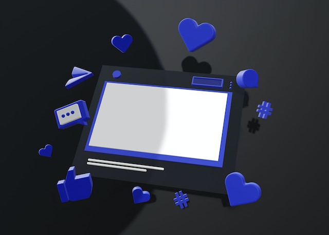 Tablet rodeado por ícones de partilha de redes sociais, como corações e polegares para cima.