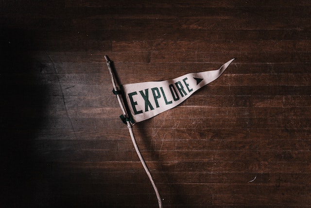 White flag with the word 
“Explore”
