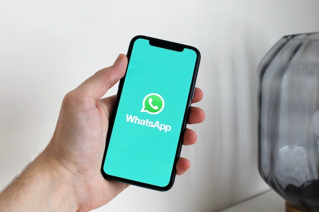 Whatsapp logo on phone.
