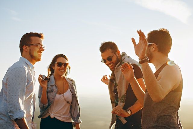 Groups of friends laughing.