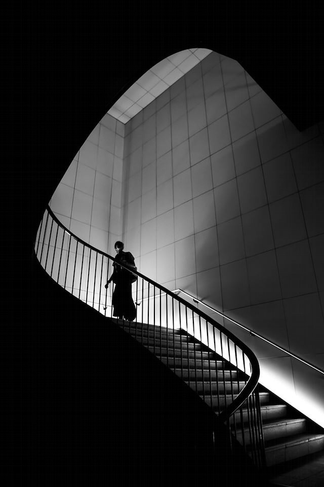 Man on staircase.