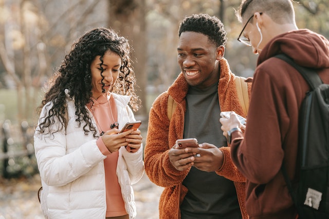 pexels-keira-burton-6146951 | Path Social Group of three friends on their phones.