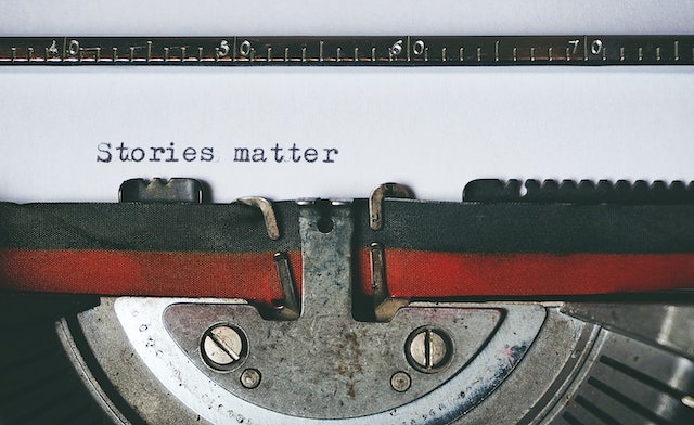 pexels-suzy-hazelwood-1995842 | Path Social Black and Red Typewriter