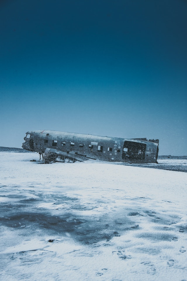 pexels-matheus-bertelli-4558660 | Path Social Abandoned plane after an accident on snowy land.