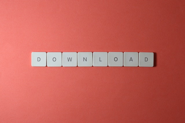 Keyboard tiles spelling out the word download representing downloading videos and Instagram photos.