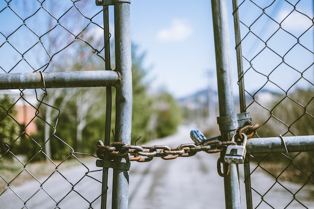 Fence with chain and lock.