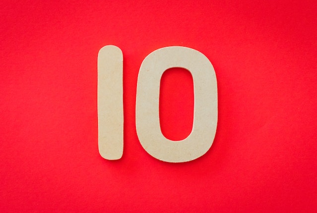 Image of number ten text on a red background.