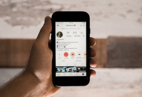photo-1528588641076-3fe42e01df36 | Path Social Instagram account displayed on a phone
