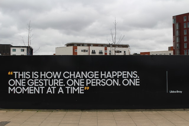 A wall with the Libba Bray quotation: “This is how change happens. One gesture. One person. One moment at a time.”