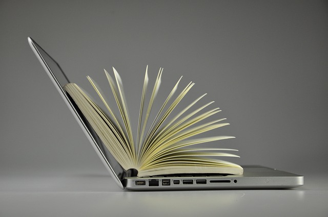 laptop-819285_640 | Path Social Side view of an open laptop with an open book on top of the keyboard.