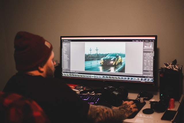 pexels-erik-mclean-5628244 | Path Social A content creator editing stunning images via AI software.