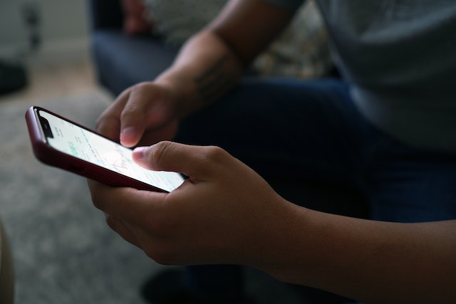 pexels-mayofi-5912323-1 | Path Social A user checking the requirements for Instagram verification.