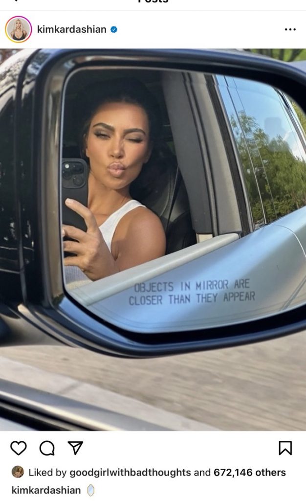 Path Social’s screenshot of a photo of Kim Kardashian from her Instagram profile taking a selfie.