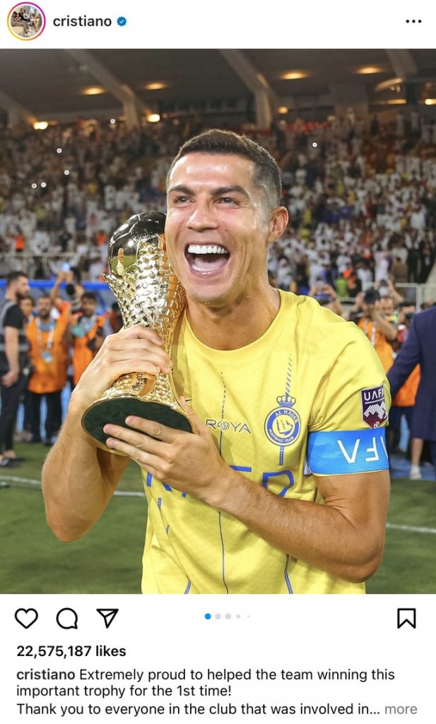 Path Social’s screenshot of a picture of Cristiano Ronaldo from his Instagram account holding a trophy after a soccer game.