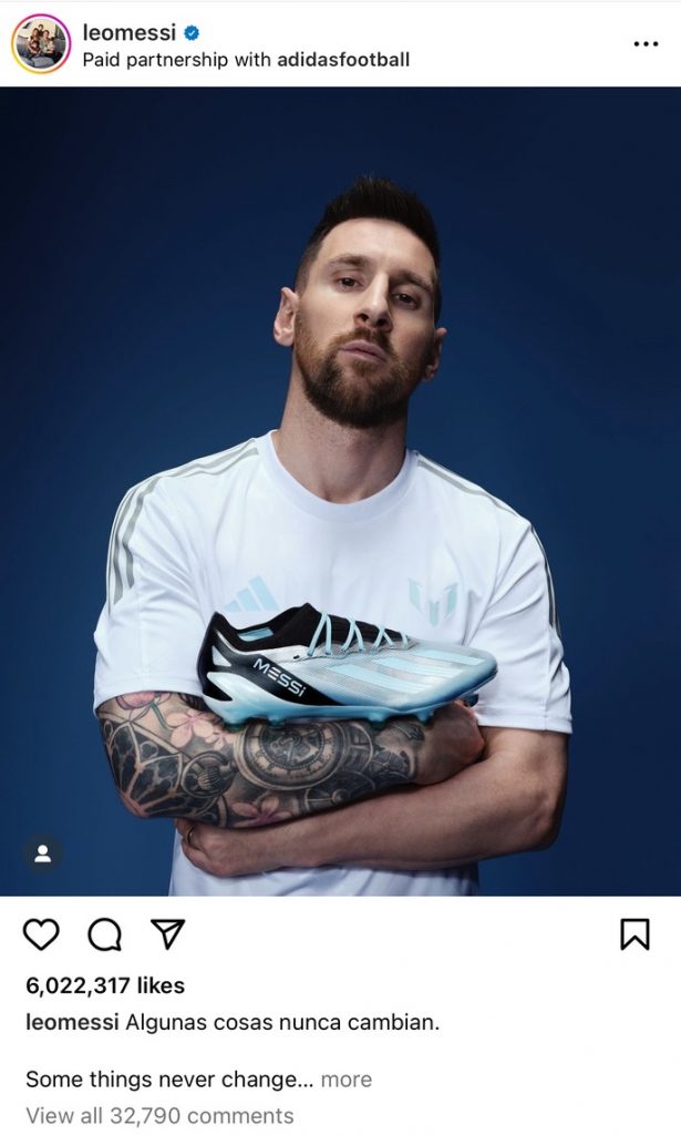 Path Social’s screenshot of a picture of Leo Messi from his Instagram profile holding a pair of Adidas cleats.