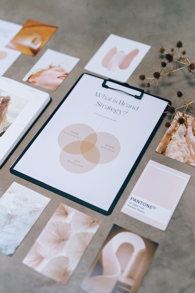Image of brand strategy materials, including a mood board, color palette, and design elements.
