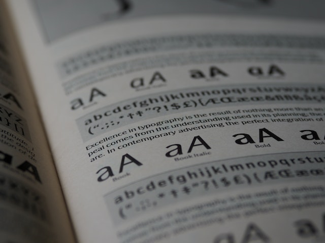 pexels-brett-jordan-5266319 | Path Social Textbook with letters in different fonts and typefaces, from italic to bold.
