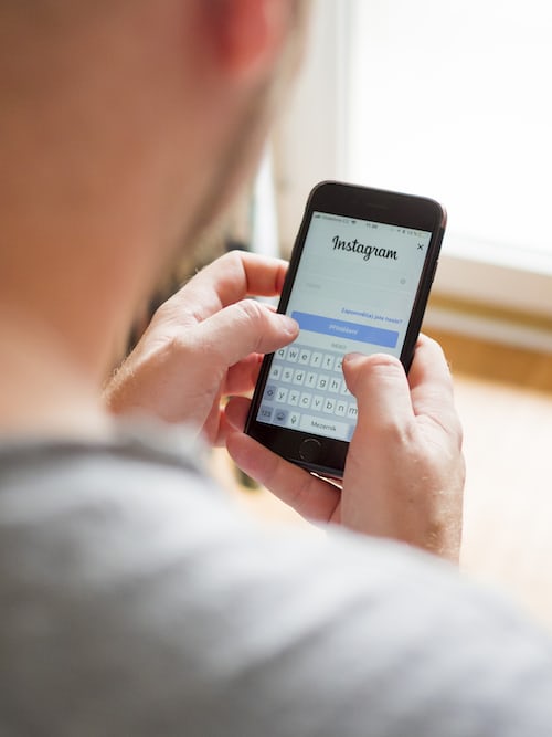 A person logging in to an Instagram account.